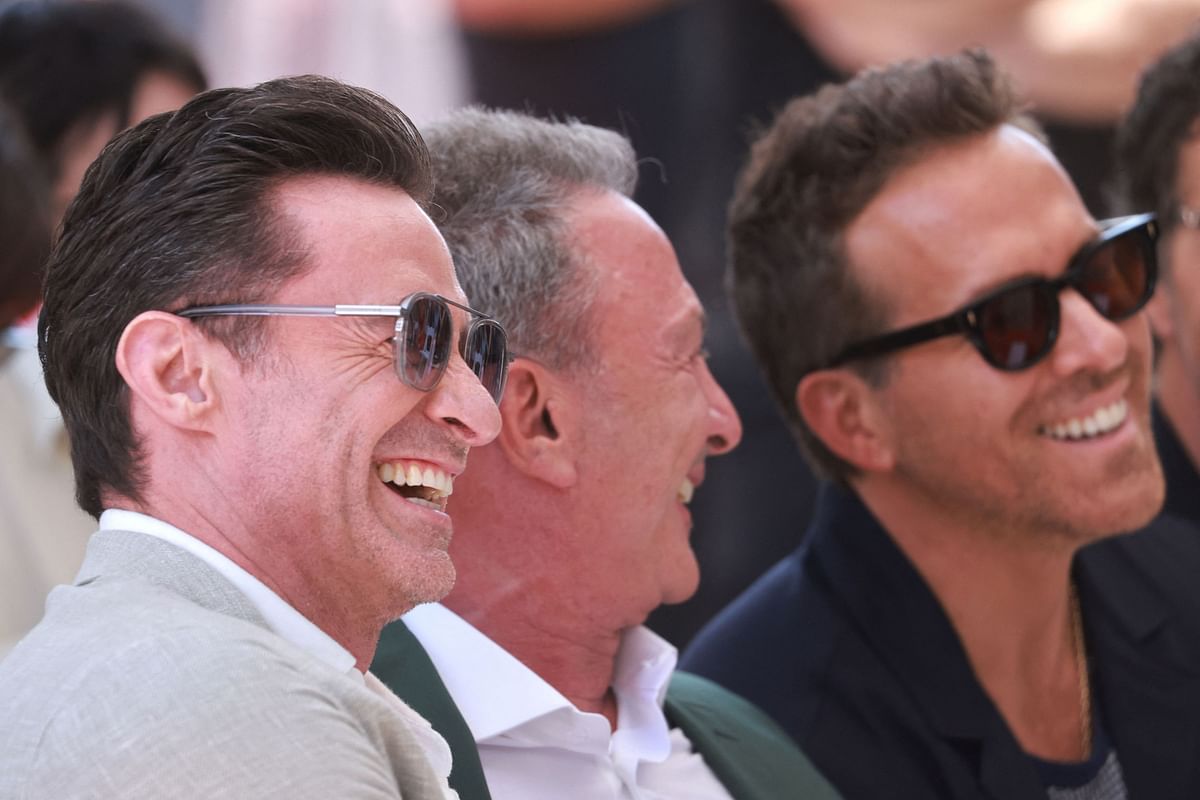 Hugh Jackman Louis D'Esposito, and Ryan Reynolds attend the ceremony honoring Feige with a star on the Hollywood Walk of Fame in front of the El Capitan Theatre, Los Angels California, U.S., July 25, 2024.