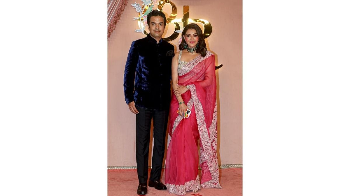 Kajal Aggarwal poses with her husband Gautam Kitchlu on their arrival.