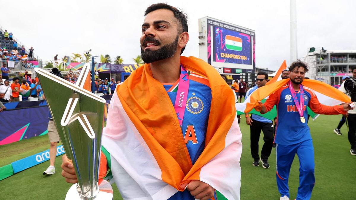 Another heartwarming image features Virat Kohli holding the trophy while enjoying the victory lap.