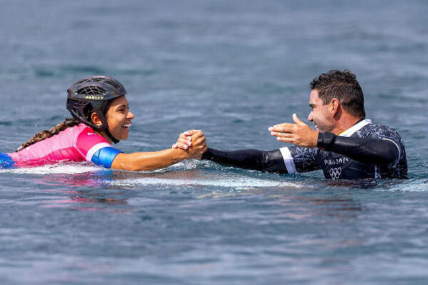 Taina Hinckel of Team Brazil celebrates with her coach.