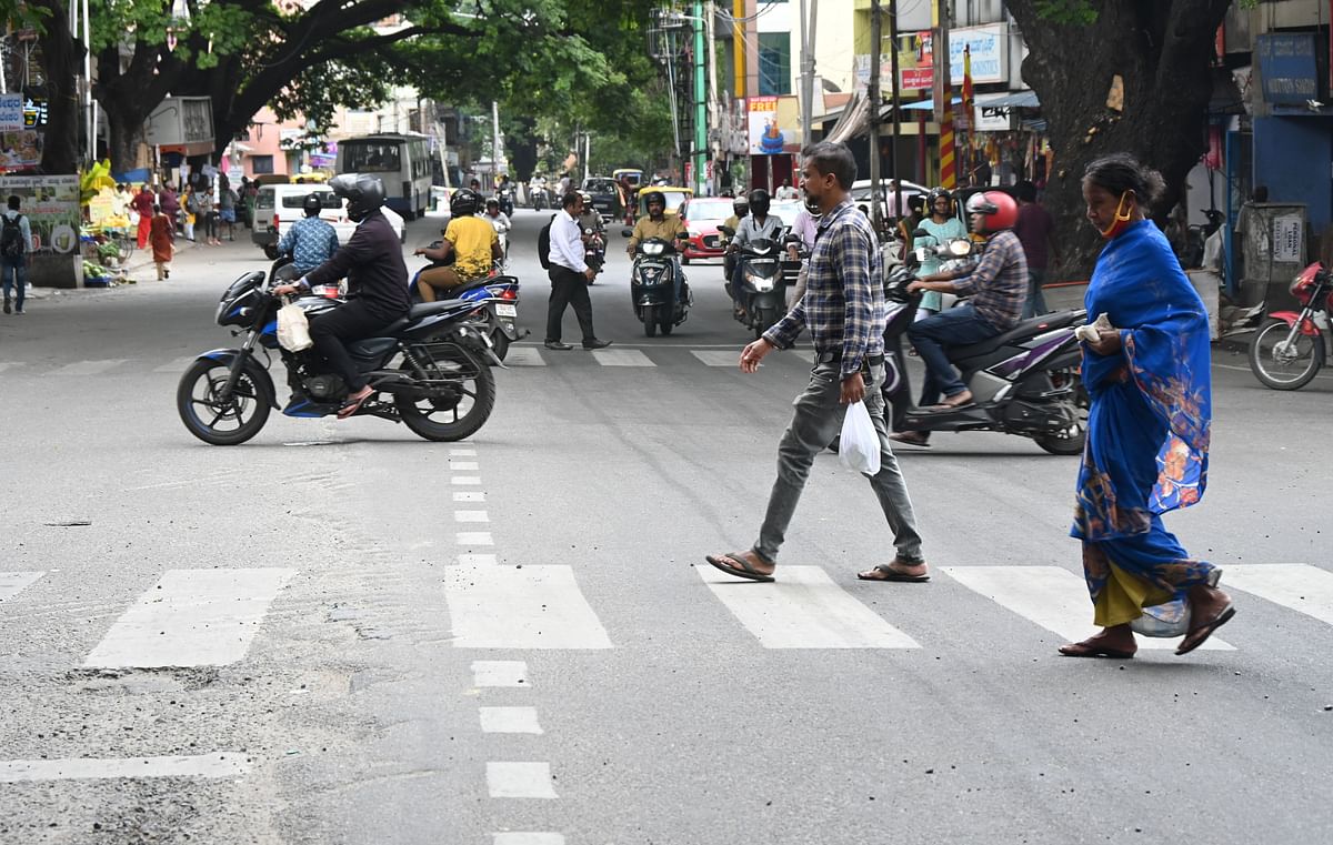 A clearly marked pedestrian crossing at Magadi Road (MC Circle to KHB Junction). 