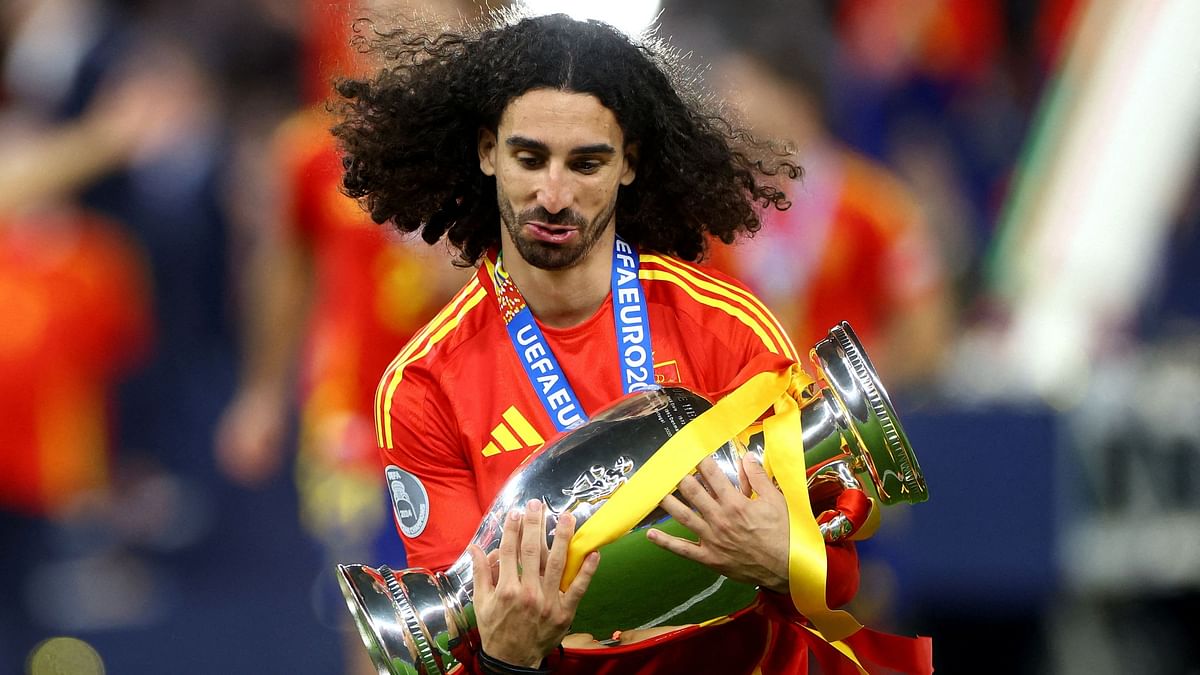 Spain's Marc Cucurella with the trophy after winning the Euro 2024 final against England.