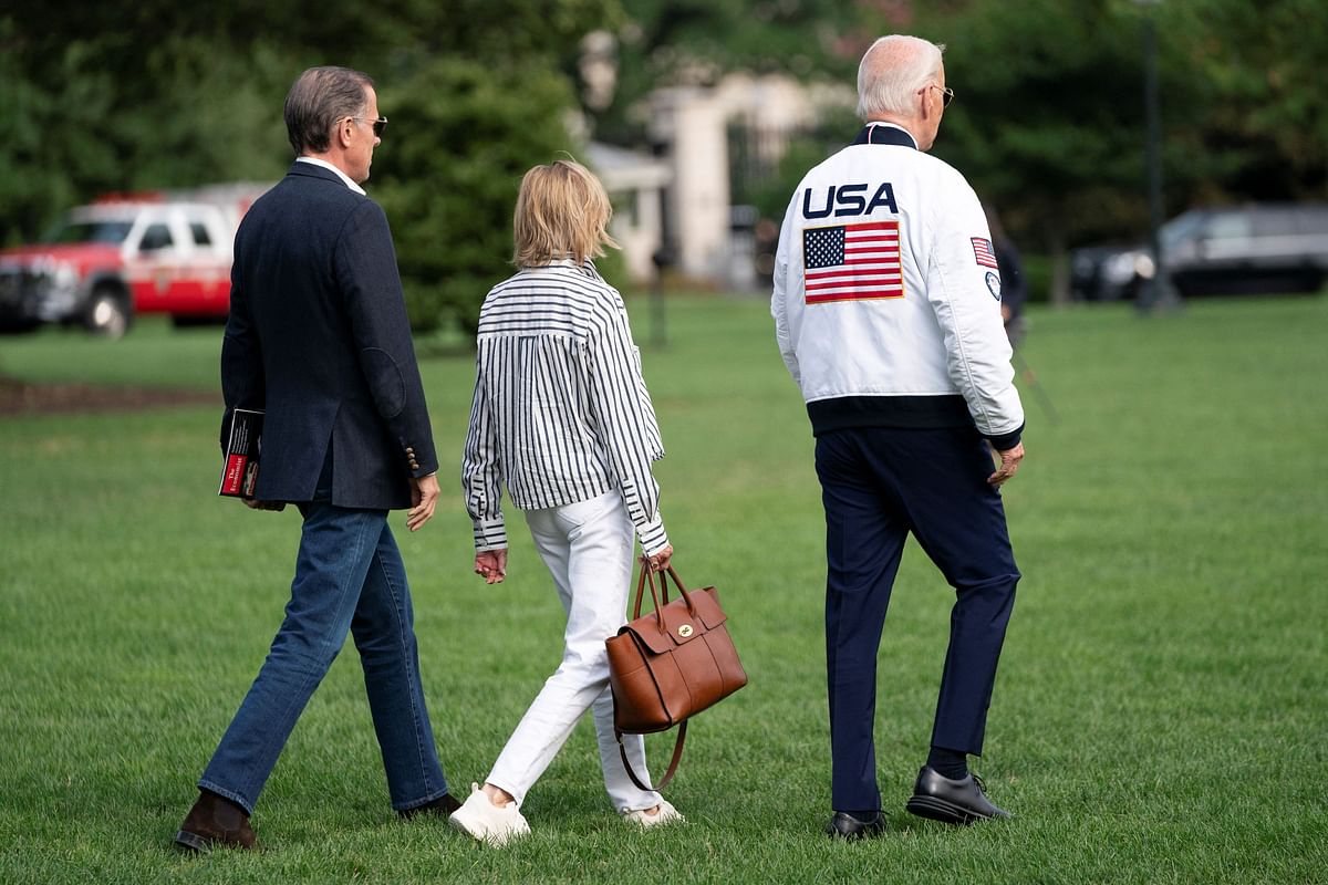 US President Joe Biden wears the team USA Olympics jacket as he departs from the South Lawn of the White House