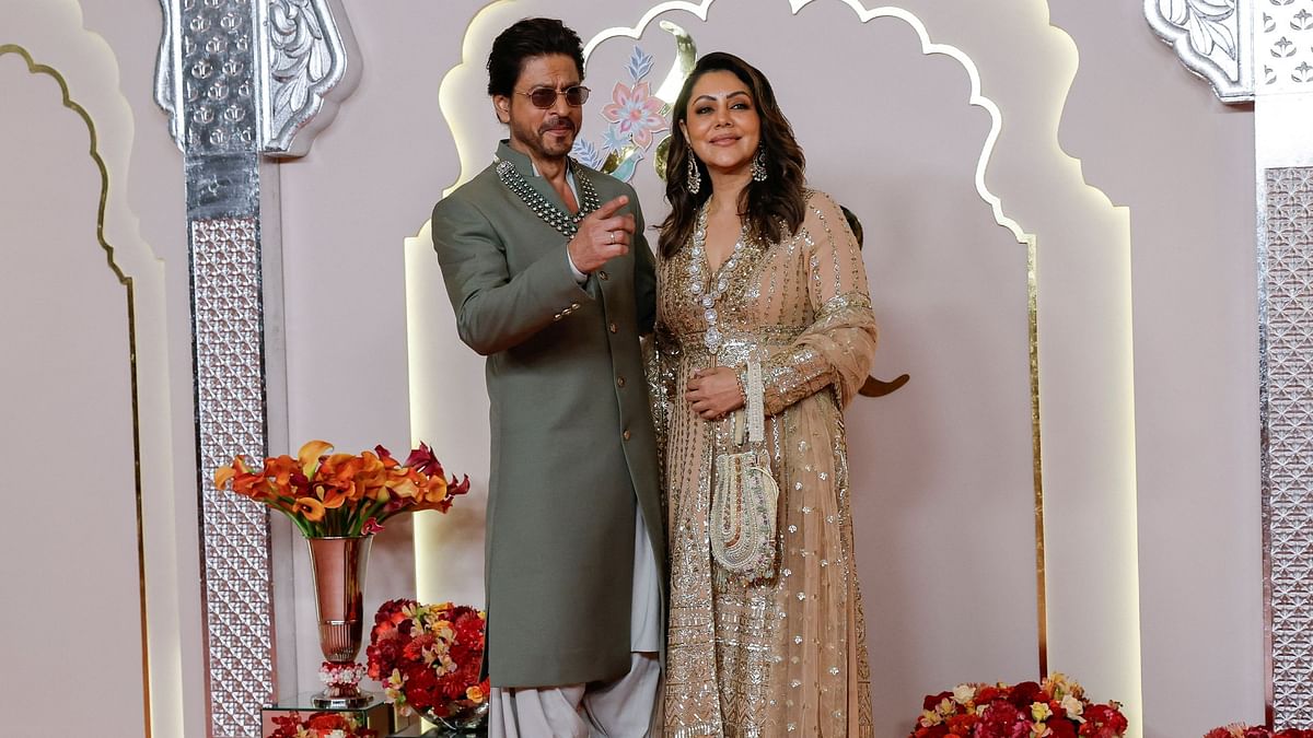 Shah Rukh Khan and Gauri Khan get clicked on their arrival.