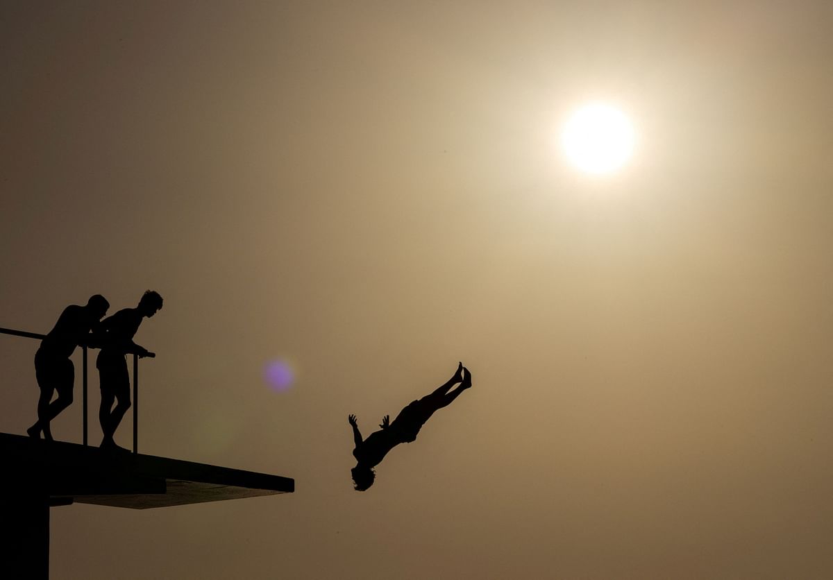 A person jumps into the Adriatic Sea as temperature rises in Zadar, Croatia, July 13, 2024.