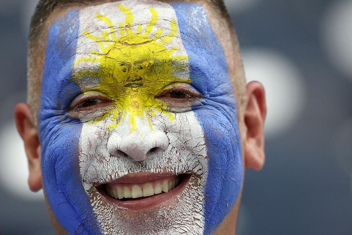 An Argentina fan inside the stadium before the match between Argentina and Ecuador. 