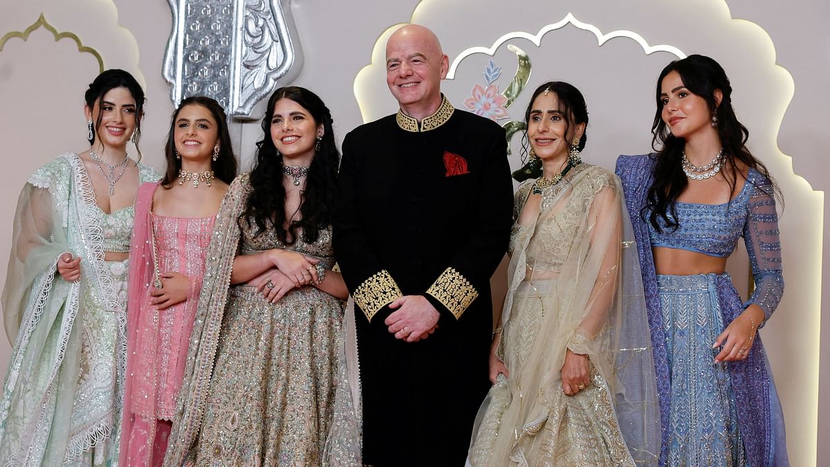 FIFA president Gianni Infantino poses with his wife Leena Al Ashqar and their children.