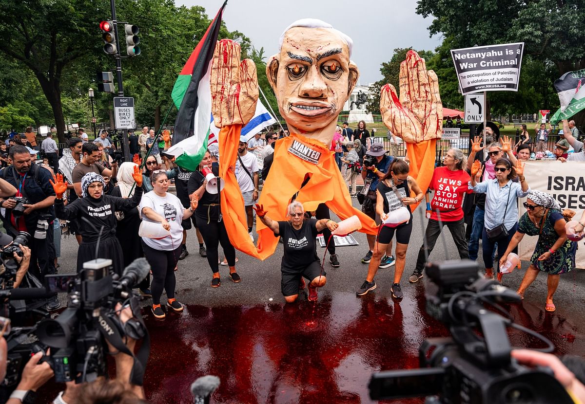 Protesters rally on the day of Israeli PM Netanyahu’s visit to the White in Washington D.C.