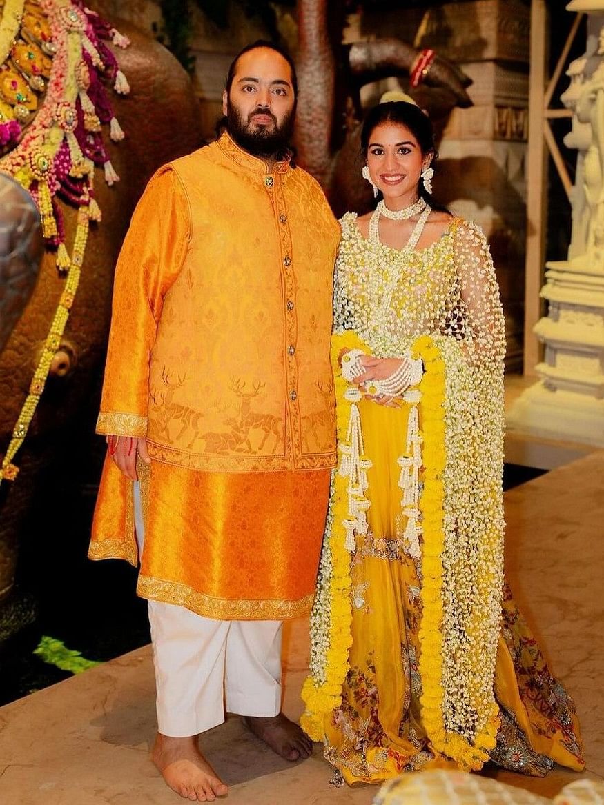 Anant Ambani and Radhika Merchant pose together for a photo during their haldi ceremony, at Antilia, Mumbai.