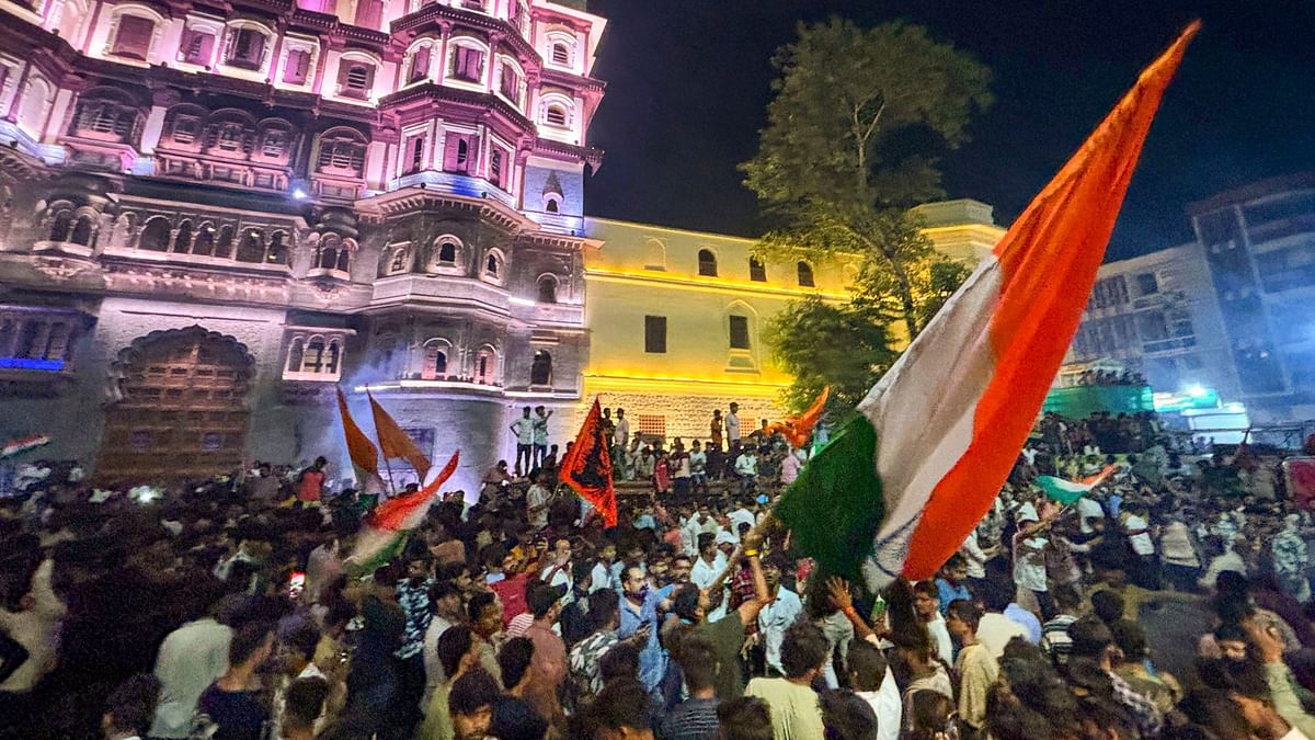 People celebrate India’s victory in the T20 World Cup final, in Indore.