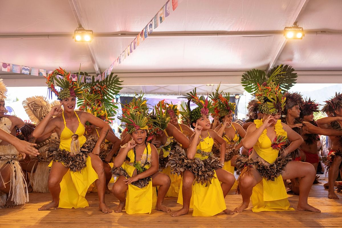 Locals perform during the opening ceremony of the Olympic Games Paris