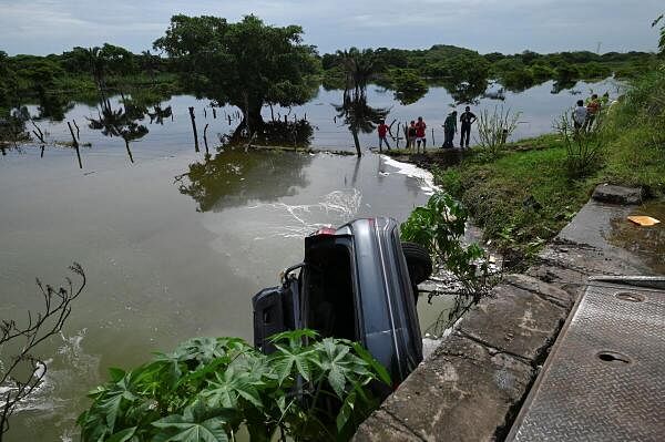 A view shows the wreckage of a car whose driver lost his way and fell into a sewage canal and died due to heavy rain according to local media, in Veracruz, Mexico on July 10, 2024. 