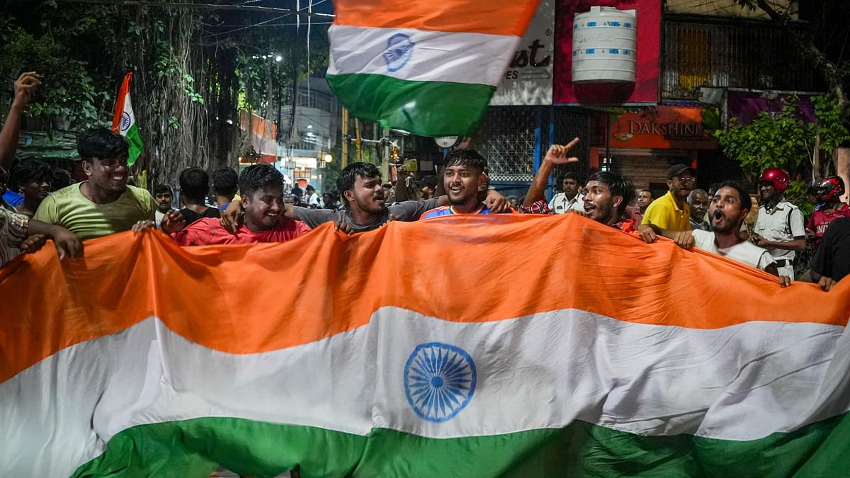 People celebrate India’s victory in the T20 World Cup final, in Kolkata.