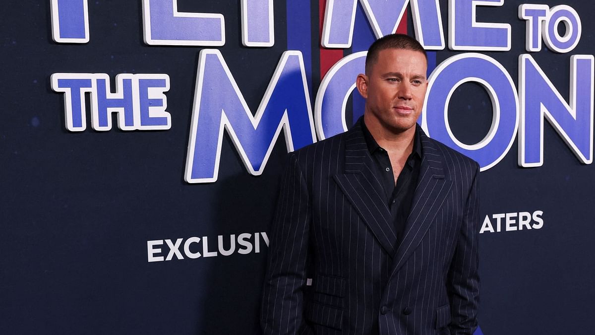 Channing Tatum looks dapper in suit at the special screening of Fly Me to the Moon in New York.