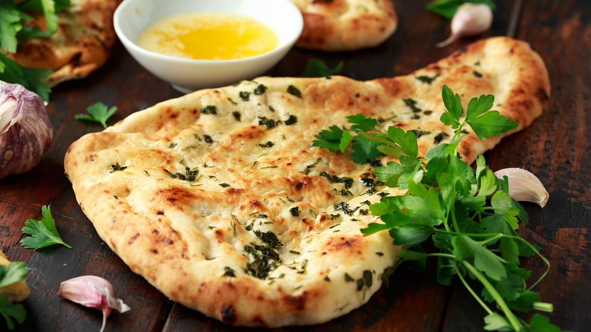 Garlic Naan: This is Indian bread made with all-purpose flour and spiced with garlic. It is served with different curries.