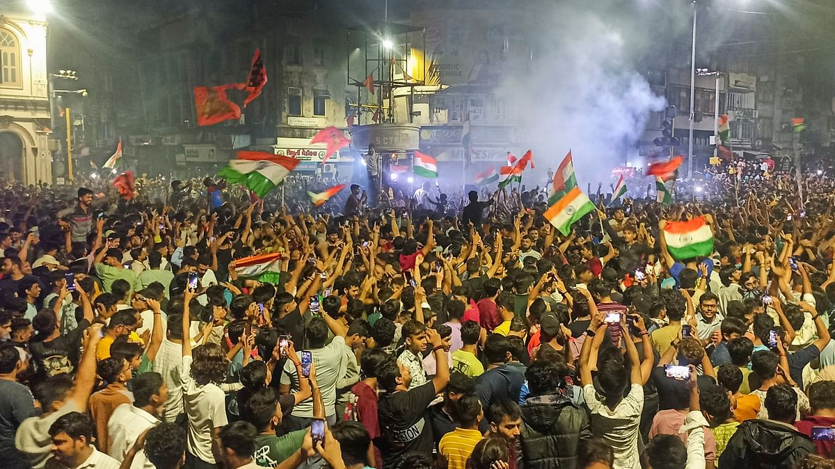 Fans celebrate after India won the T20 World Cup 2024, at Bhagal Char Rasta, in Surat.