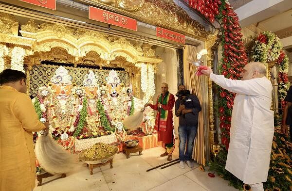 Union Home Minister Amit Shah offers prayers at the Jagannath Temple on 'Rath Yatra' festival, in Ahmedabad, Sunday on July 7, 2024.