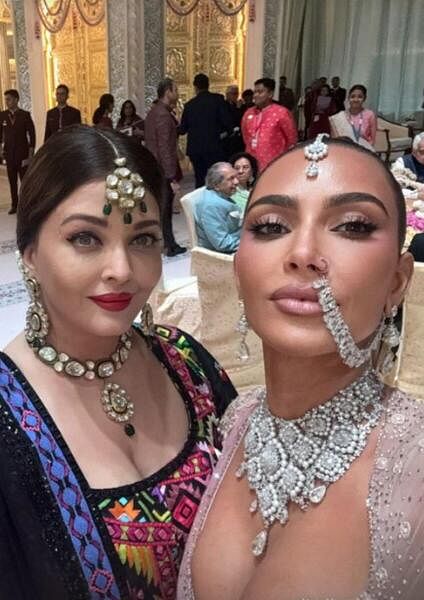 Bollywood actor Aishwarya Rai Bachchan and American media personality Kim Kardashian during the blessing ceremony of the newlyweds Anant Ambani and Radhika Merchant, in Mumbai.