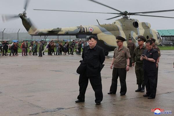 North Korean leader Kim Jong Un observes rescue efforts in flooded areas near the country's border with China, in North Pyongan Province