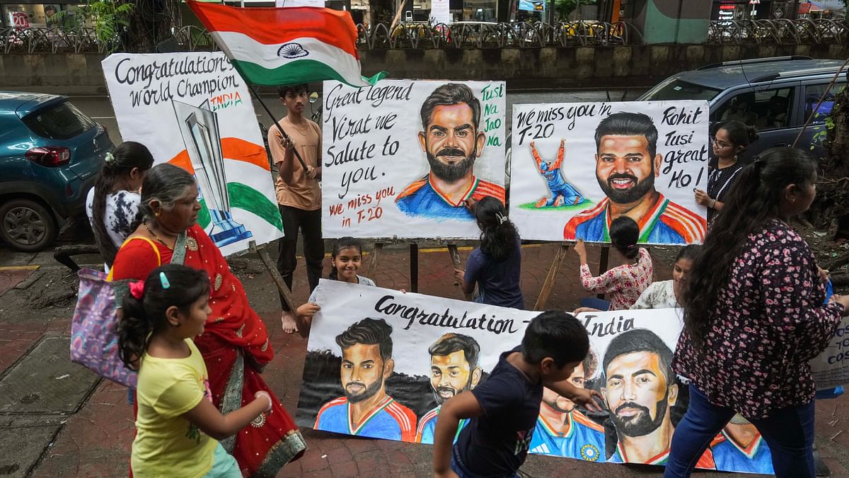 Students of Gurukul School of Art draw portraits in Mumbai after India won the T20 World Cup.