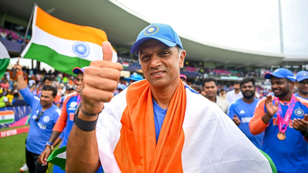 One of the priceless pictures -- Team India's Head Coach Rahul Dravid gestures during the victory lap at Kensington Oval in Bridgetown, Barbados.