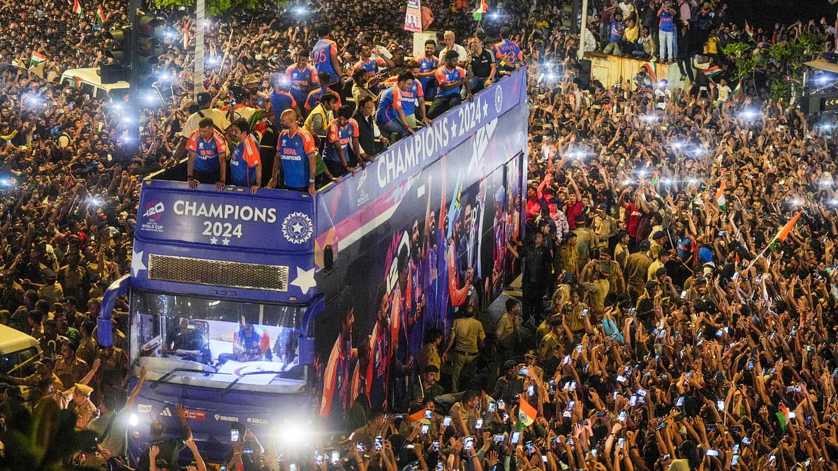 Thousands of fans thronged the Marine Drive in south Mumbai to witness the victory parade of the Indian cricket team.