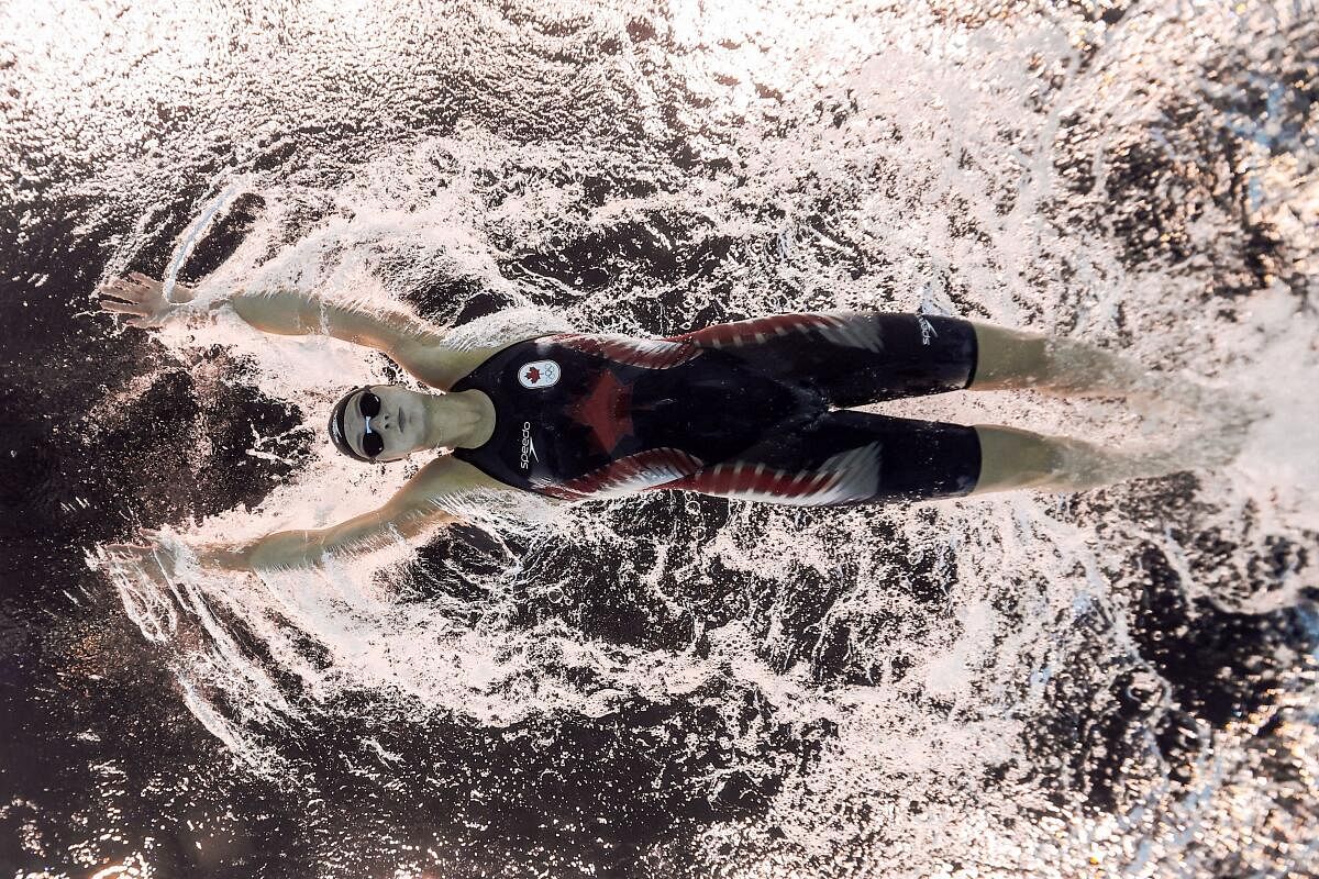 Paris 2024 Olympics - Swimming - Women's 200m Butterfly - Heats - Paris La Defense Arena, Nanterre, France - July 31, 2024. Summer McIntosh of Canada in action