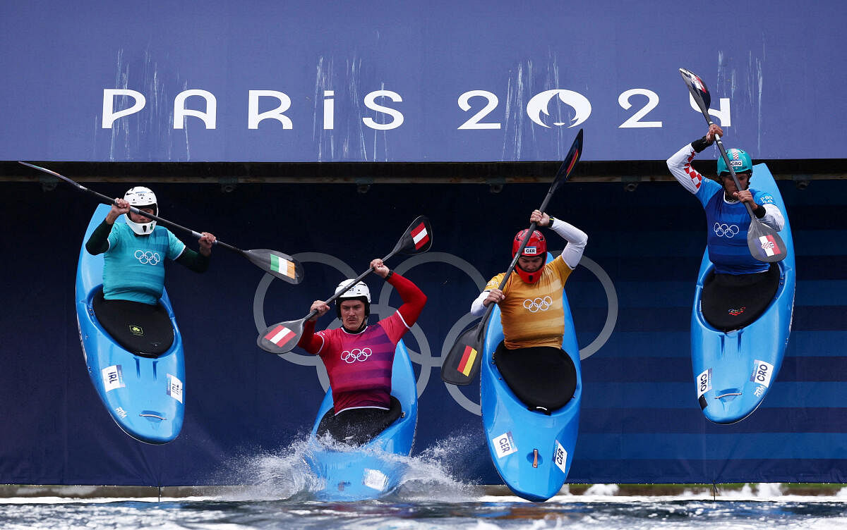 Paris 2024 Olympics - Slalom Canoe - Men's Kayak Cross Round 1 - Vaires-sur-Marne Nautical Stadium - Whitewater, Vaires-sur-Marne, France - August 03, 2024. Felix Oschmautz of Austria, Liam Jegou of Ireland, Matija Marinic of Croatia and Stefan Hengst of Germany in action.