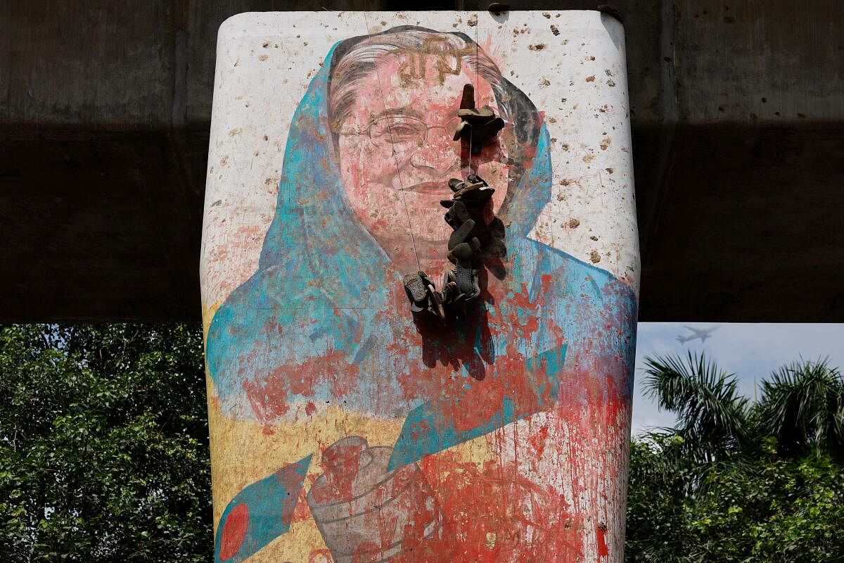 A view shows a mural of Bangladeshi Prime Minister Sheikh Hasina vandalised by protesters, a day after her resignation, in Dhaka, Bangladesh, August 6, 2024.