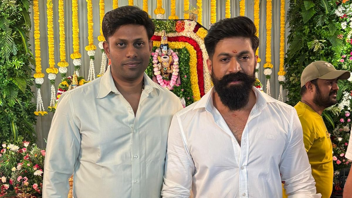 Mohan Suprith poses with Yash during the movie puja of Kannada film Toxic.