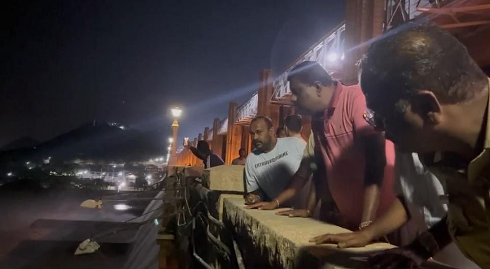 Onlookers at the dam site