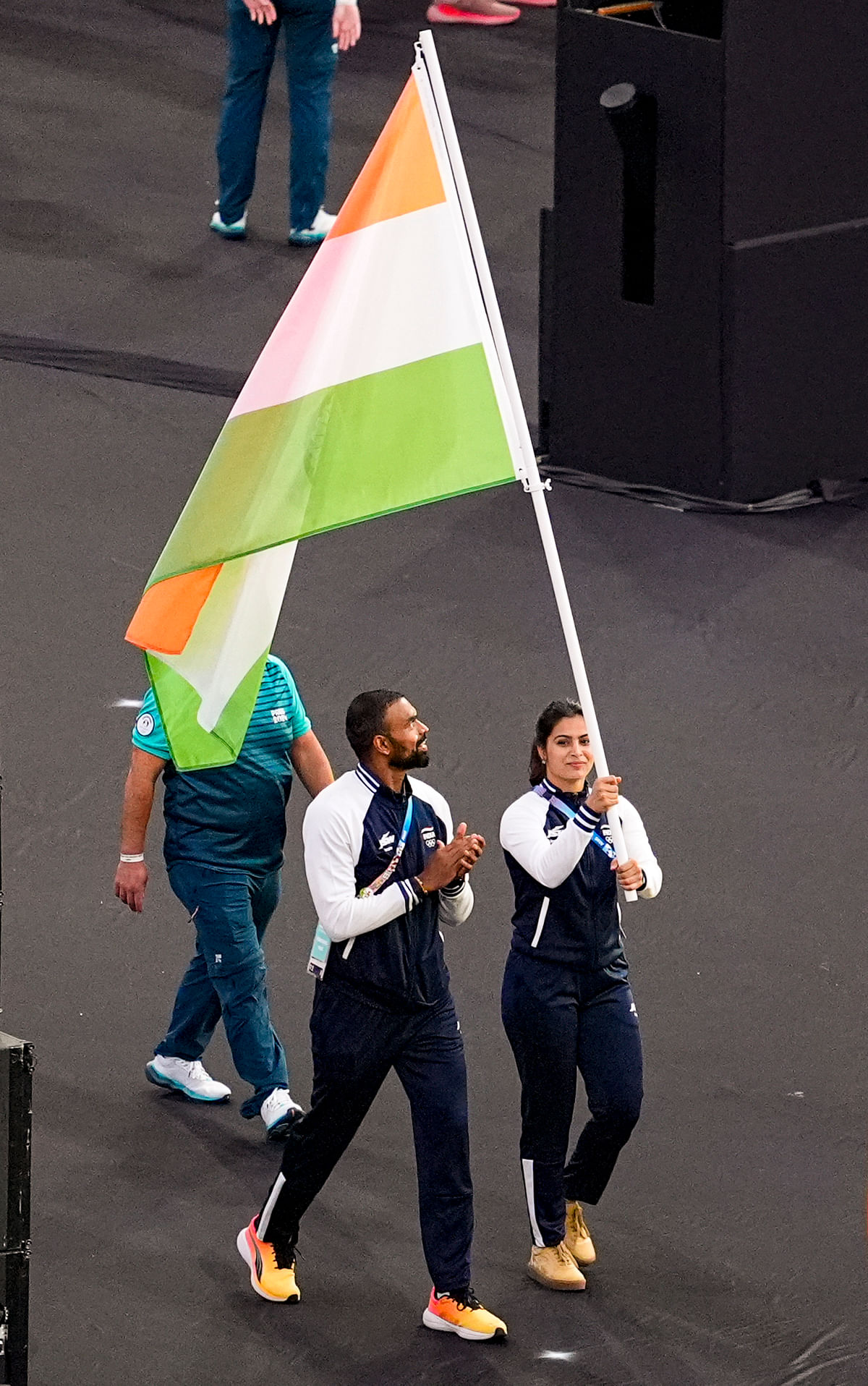 India’s flag-bearers shooter Manu Bhaker (right) and men’s hockey team goalkeeper PR Srejeesh. 