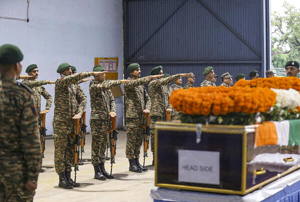 Army personnel pay tribute to Captain Deepak Singh, who was killed in a gunfight with terrorits in J&amp;K's Doda, during a wreath-laying ceremony in Jammu, Thursday, Aug. 15, 2024.