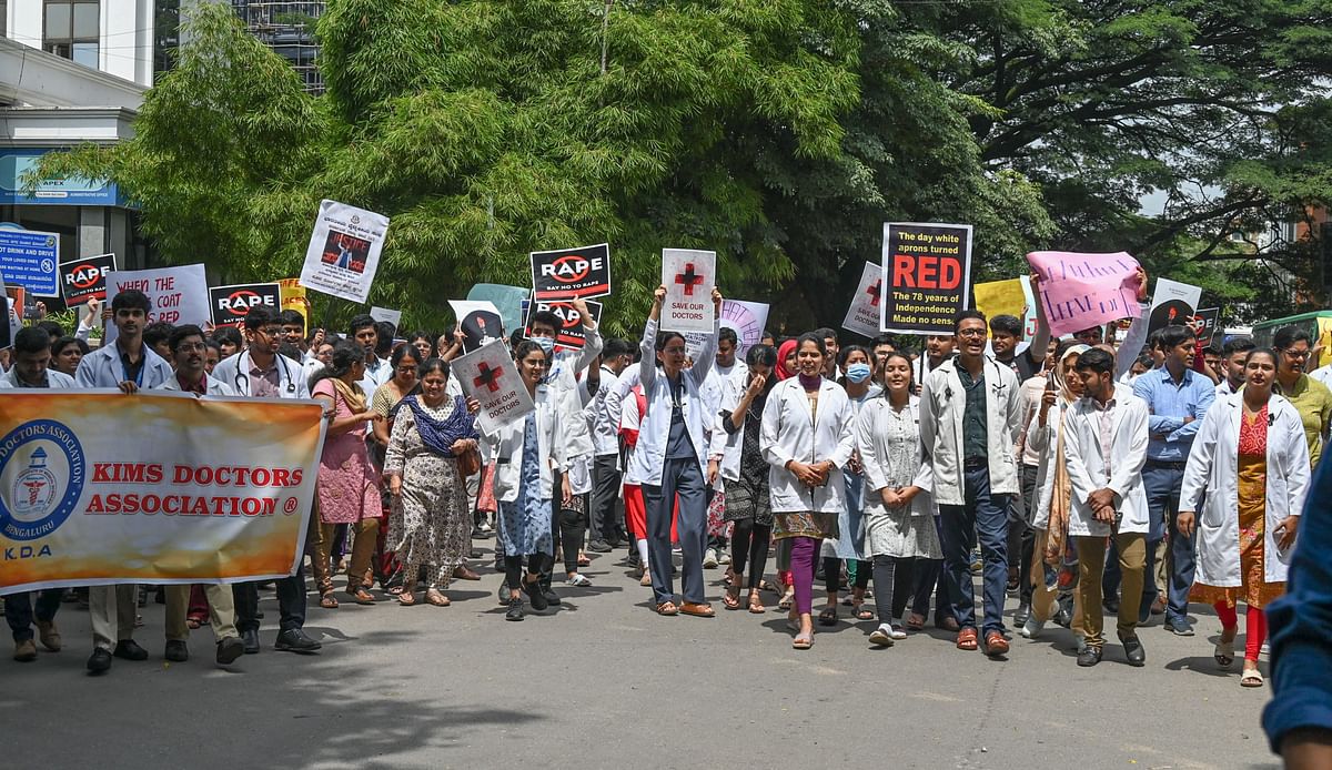 Doctors Nurses and health workers take part in a protest march condemning violence against medical professionals in Bengaluru on Saturday. 