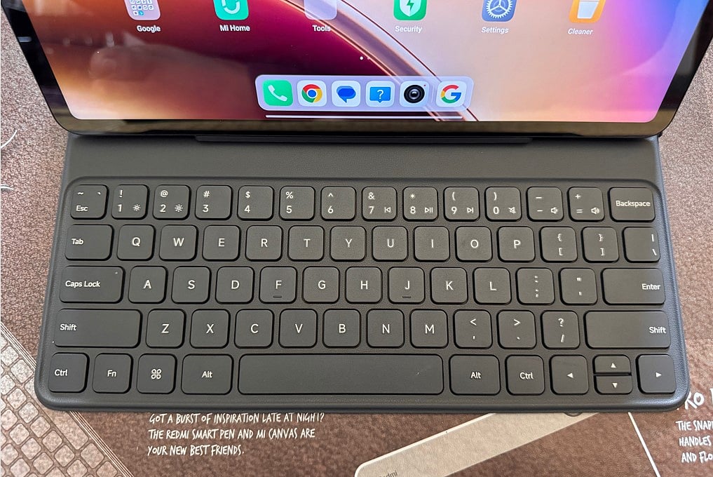 The Redmi Pad Pro 5G smart keyboard cover comes with a standard 64-key layout keyboard.