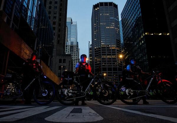 Police officers stand during a protest in support of Palestinians near the Israeli consulate, as the Democratic National Convention (DNC) is held, in Chicago, Illinois, US.