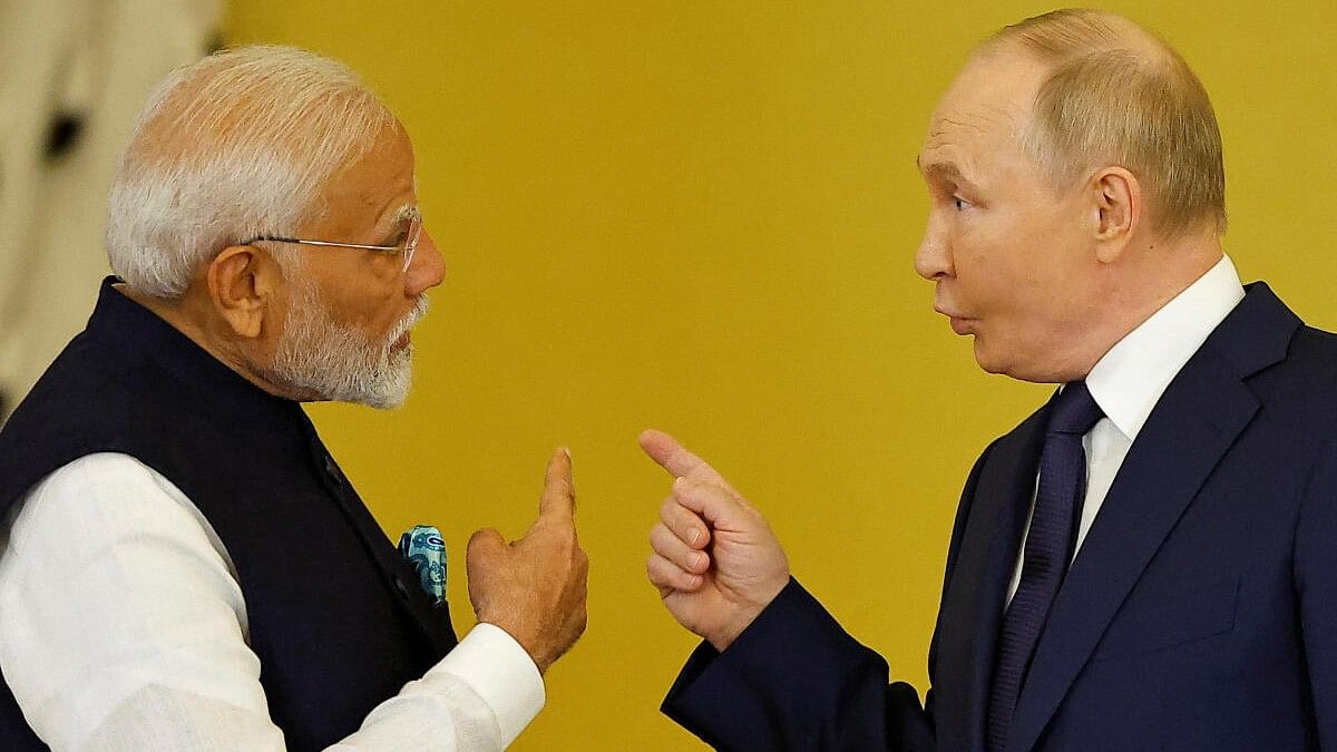 Russia's President Vladimir Putin talks to India's Prime Minister Narendra Modi.