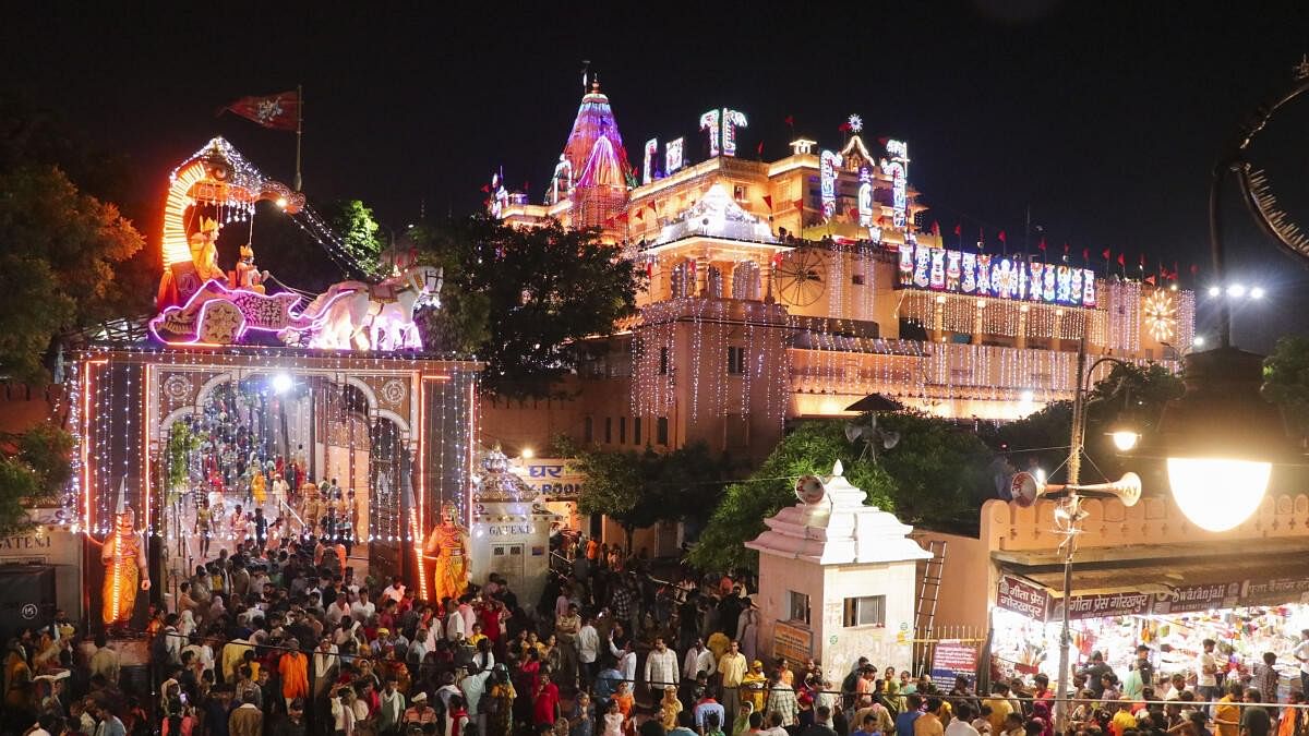 Devotees during Sri Krishna Janmashtami celebrations at Sri Krishna Janamsthan temple, in Mathura.