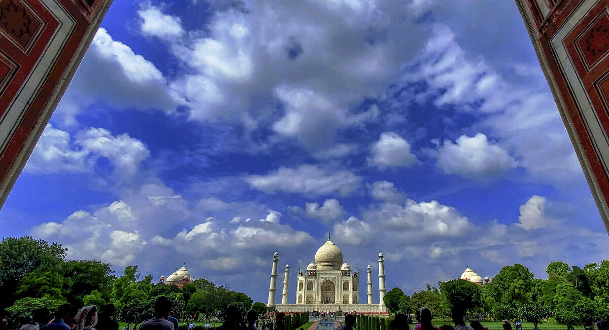 Clouds hover over the Taj Mahal, in Agra.