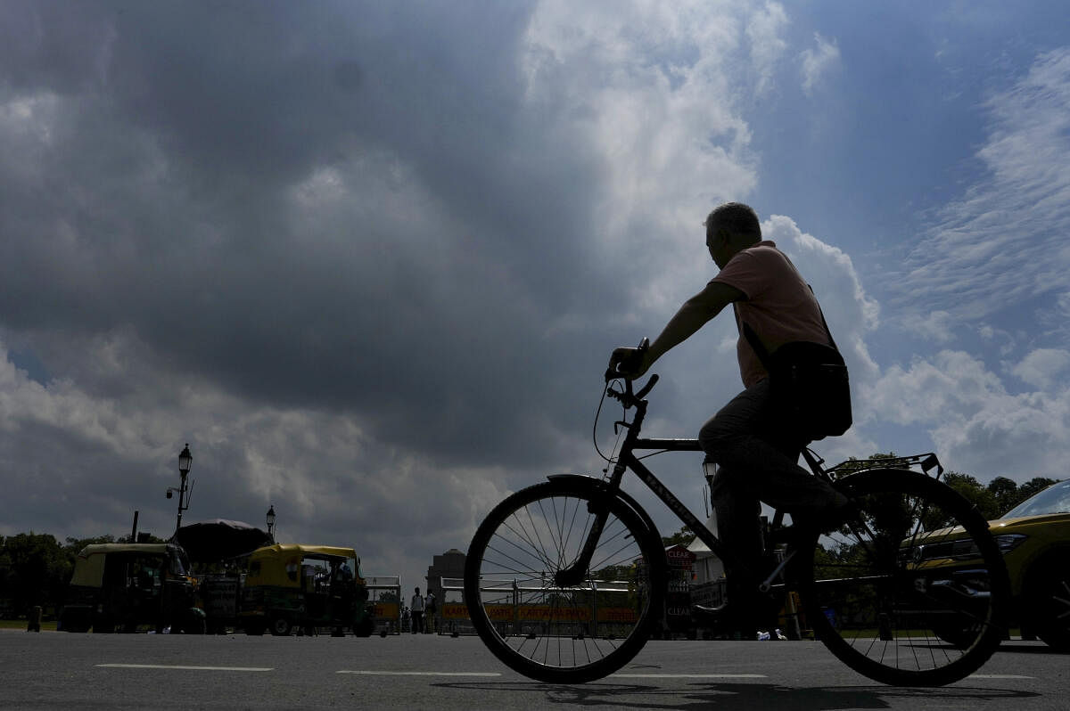 Clouds hover in the sky over the Raisina Hill, in New Delhi