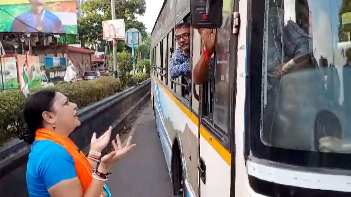 BJP MLA Agnimitra Paul appeals to a bus driver to cooperate during the party's 12-hour general strike in Bengal.