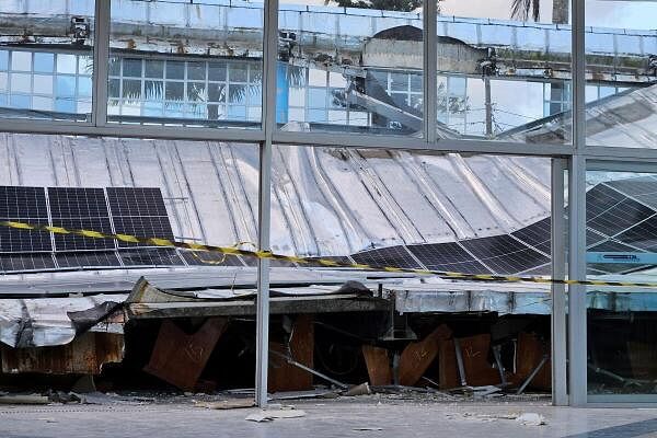 Destroyed benches are seen inside a church after a roof collapsed in Recife in the state of Pernambuco, Brazil/