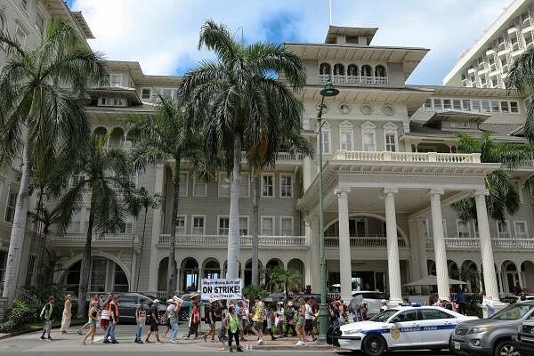 Hotel workers strike in Waikiki as some 10,000 U.S. hotel workers represented by the Unite Here union began a multi-day strike in several cities after contract talks with hotel operators Marriott International, Hilton Worldwide and Hyatt Hotels reached an impasse, in Honolulu, Hawaii.