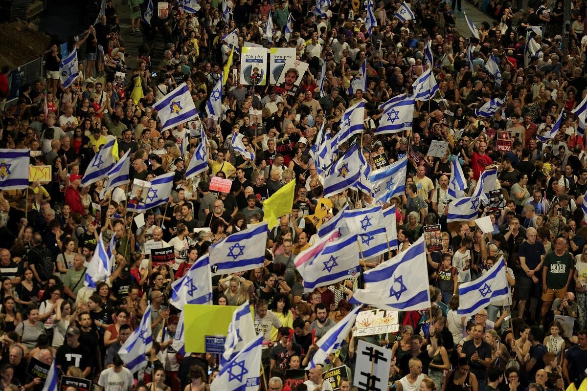 People gather to protest against the government and to show support for the hostages who were kidnapped during the deadly October 7 attack, amid the ongoing conflict in Gaza between Israel and Hamas, in Tel Aviv, Israel September 2, 2024.