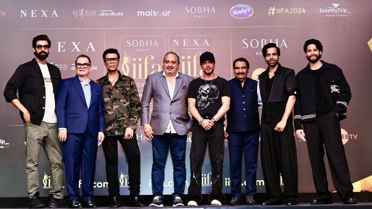 Celebrities pose with the organisers during a press conference for the 24th edition of the International Indian Film Academy (IIFA) Weekend and Awards, in Mumbai.