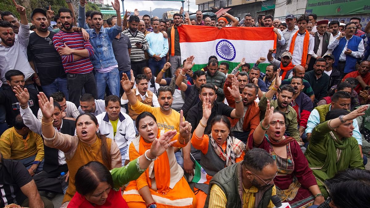 People stage a protest over illegal construction in a mosque, at Sanjauli locality in Shimla.