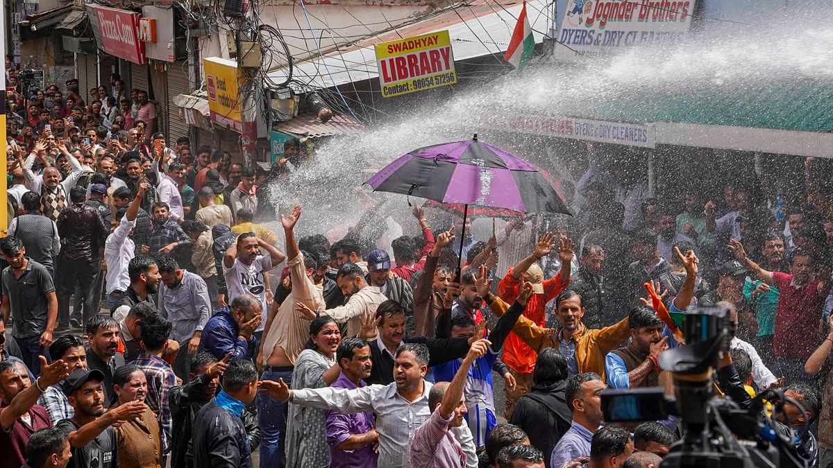 Police resorted to lathi charges and deployed water cannons to disperse protesters after they broke through a second barricade near the mosque in Sanjauli.