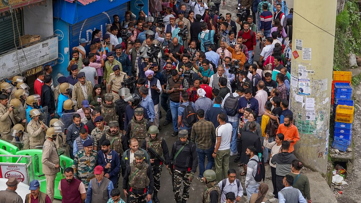 Security personnel keep vigil after prohibitory orders were imposed in the Sanjauli locality in Shimla.