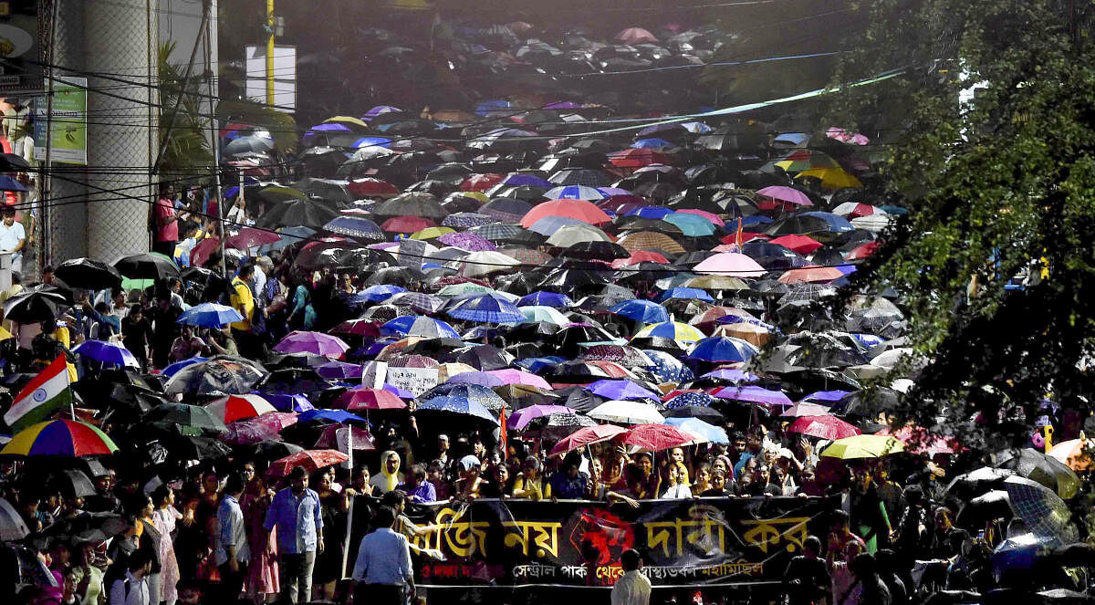 Medics take part in a protest march to Swasthya Bhavan in Kolkata.