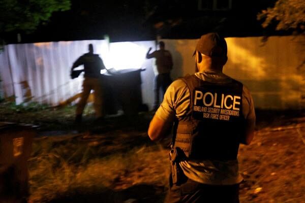 Secret Service and Homeland Security agents check a former home of a suspect named by news organizations as Ryan W. Routh as the FBI investigates what they said was an apparent assassination attempt in Florida on Republican presidential nominee and former U.S. President Donald Trump, in Greensboro, North Carolina, US